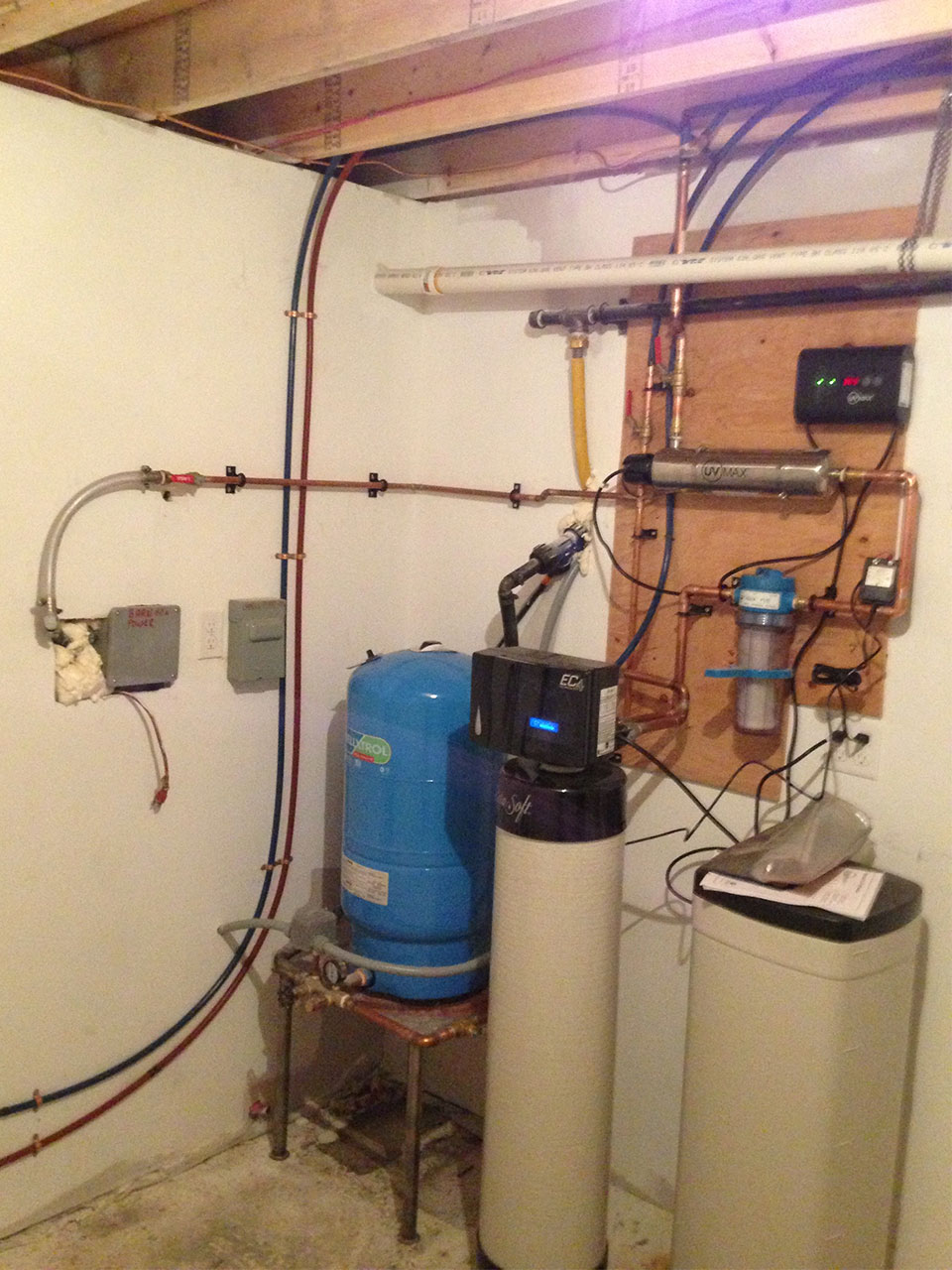 UV water treatment with water softener filtration system