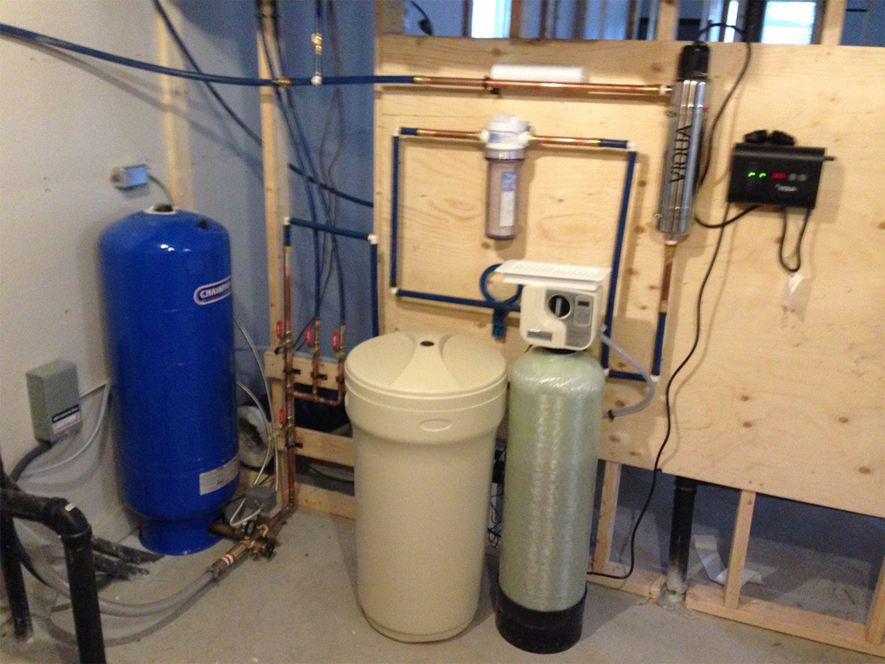 UV water treatment with water softener filtration system